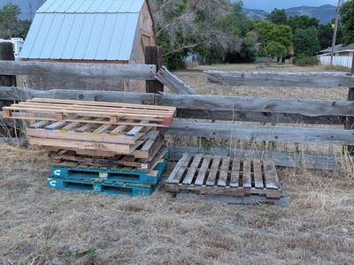 Assorted Wooden Pallets - Mixed Sizes & Conditions for DIY, Shipping, or Crafts