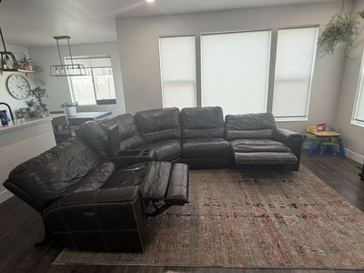 Sectional with two reclinable chairs that have charging ports - middle console with charging port