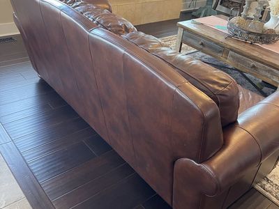 Traditional Brown Leather Sofa with Nailhead Trim. Must go Monday the 10th.