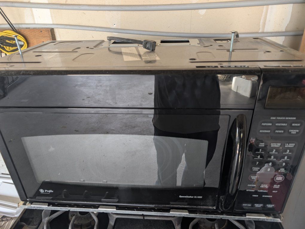 GE Profile Spacemaker XL1800 Over-the-Range Microwave - Black, Used