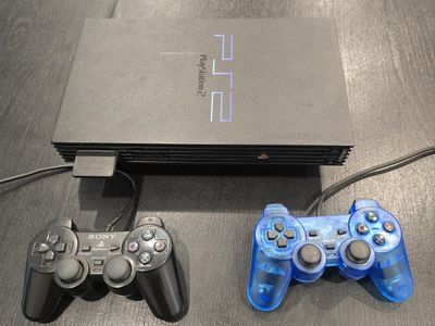 PlayStation 2 with 2 Controllers & Games