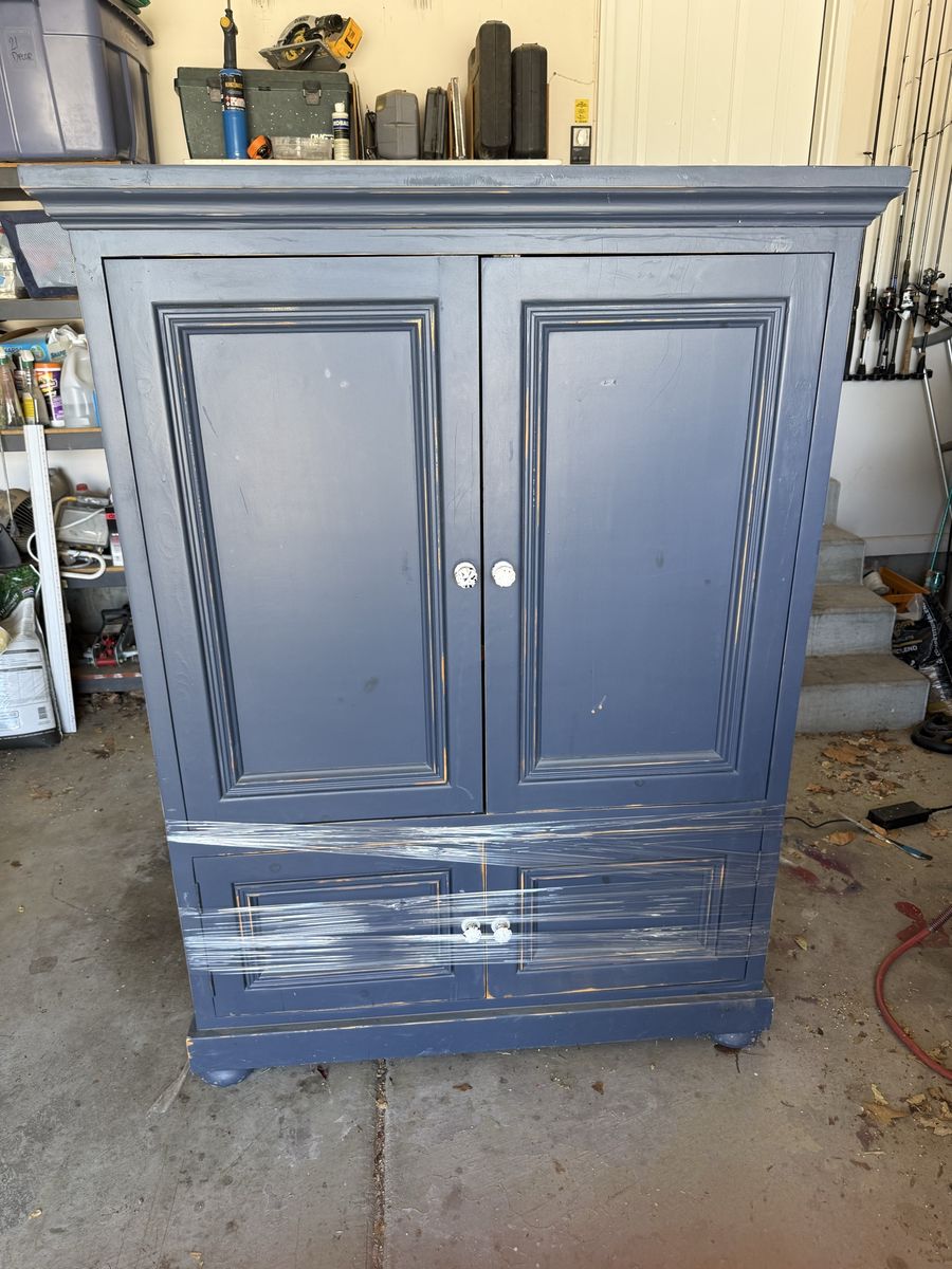 Black goose armoire