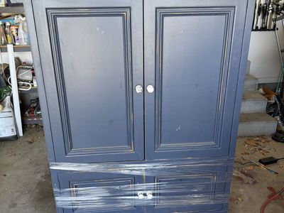 Black goose armoire