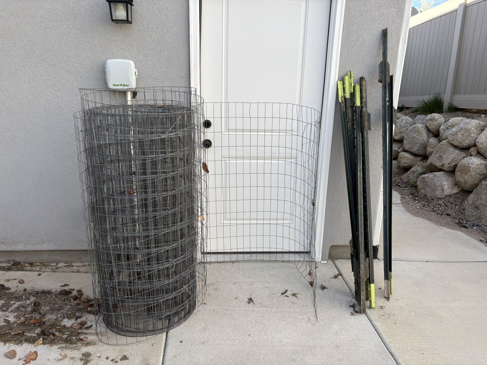 Wire fencing and steel poles