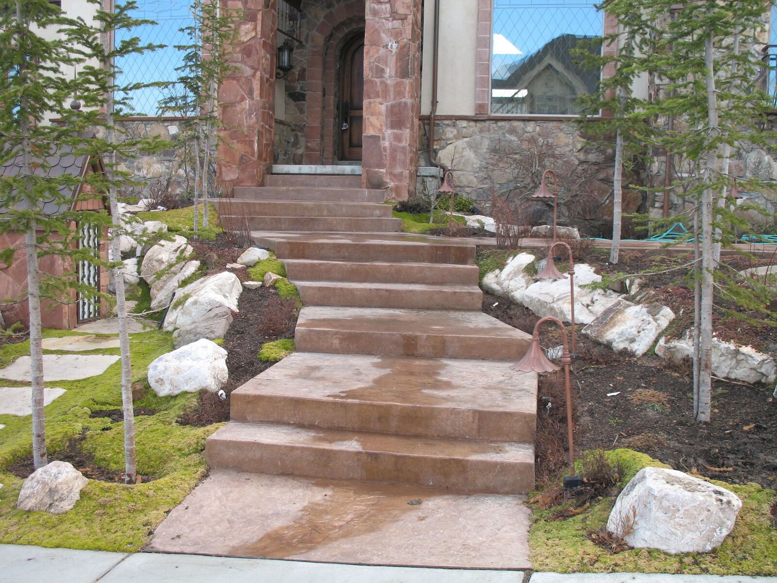 Water Features | Landscaping | Retaining Walls | Concrete Curbing | Trenching