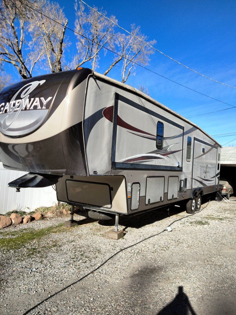 luxury 2015 Heartland Gateway 3900SE fifth wheel. 4 slide outs, approximately 500 sq ft.
