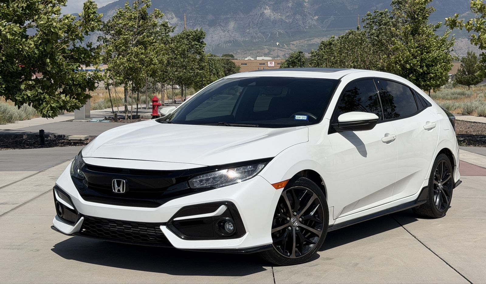 2021 Honda Civic Sport Touring — rebuilt & branded title, 24% below market