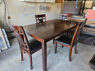 Brown table and 4 chairs