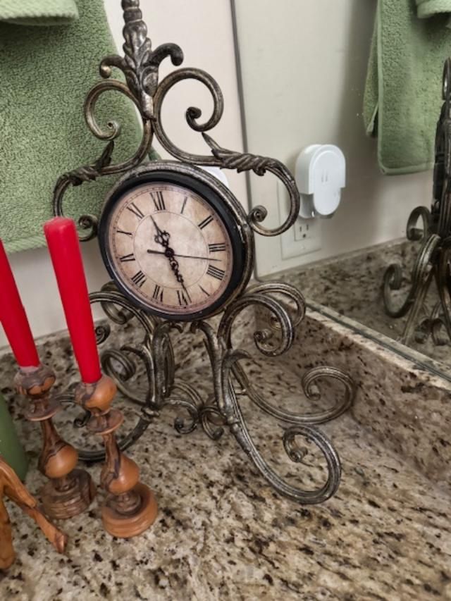 wrought iron mantle clock is a decorative "retro style" piece