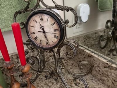 wrought iron mantle clock is a decorative "retro style" piece
