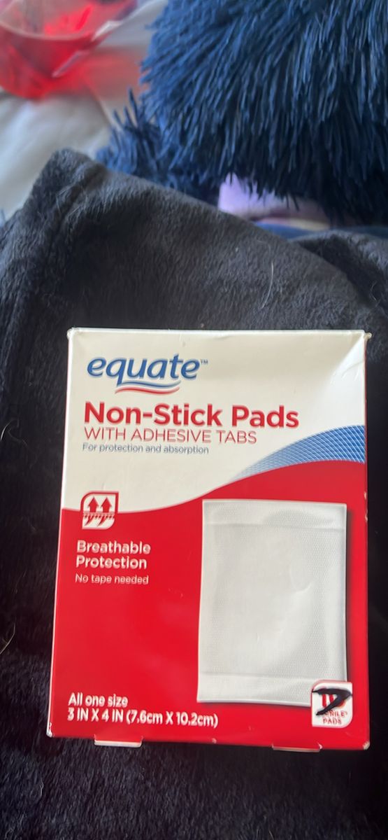 Non-stick Pads With Adhesive Tabs