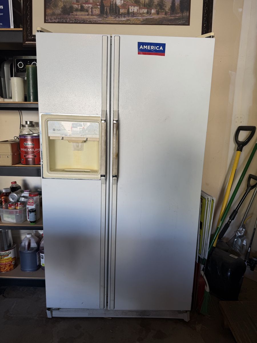 GE Profile White Side-by-Side Refrigerator with Ice & Water Dispenser works great