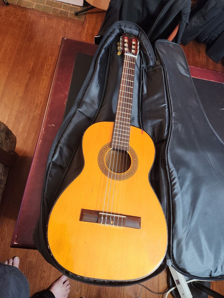 1970's Tempo Japanese made classical acoustic guitar with nice bag, parlor sized, new strings, sounds and plays great.