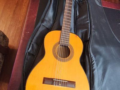 1970's Tempo Japanese made classical acoustic guitar with nice bag, parlor sized, new strings, sounds and plays great.
