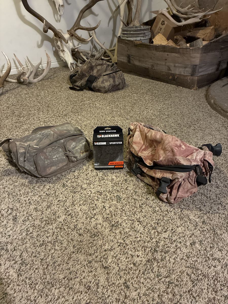 Blackhawk Sportster Serpa Holster $40.     2 Camo Fanny Packs $10 each       Hunting/Outdoor Gear