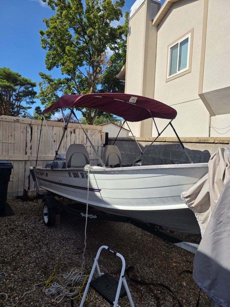 1999 Starcraft Aluminum Fishing Boat with Mercury FourStroke Outboard and Trailer