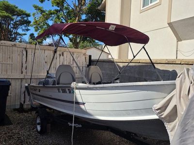 1999 Starcraft Aluminum Fishing Boat with Mercury FourStroke Outboard and Trailer