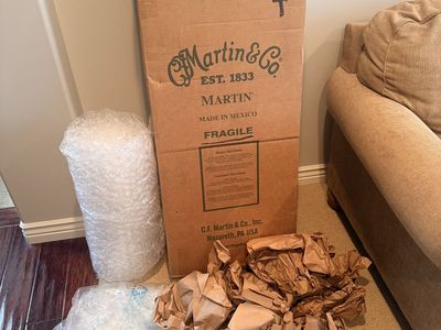 Guitar Shipping Box with bubble wrap and packing paper