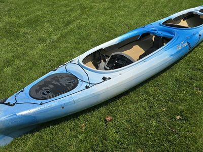 Old Town Dirigo Tandem Inc paddle and lifevest.