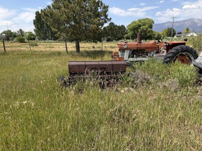 Massey Ferguson Farm Tractor with Vintage Case Planter - Agricultural Equipment