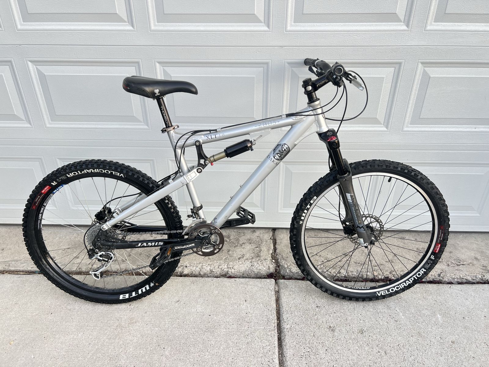 Jamis Dakar XLT 1.0 Full Suspension Mountain Bike - Silver/Black - WTB Velociraptor Tires