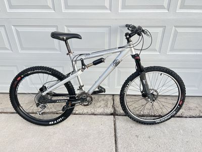 Jamis Dakar XLT 1.0 Full Suspension Mountain Bike - Silver/Black - WTB Velociraptor Tires