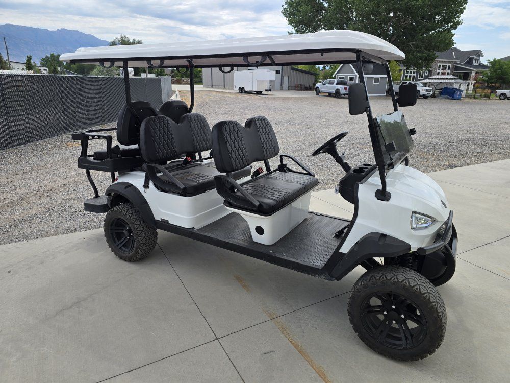 White Mammouth 6-Seater Golf Cart - Extended Top, Off-Road Tires.