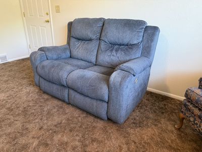 Split automated recliner love seat.