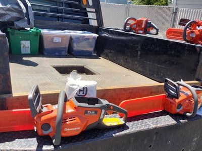 Husqvarna Chainsaws, trimmers, batteries and chargers, automatic lawn mower, great deals! Make offer