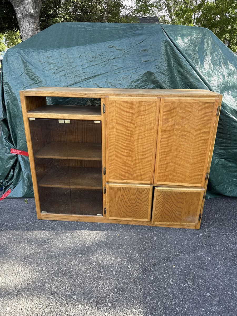 Oak Entertainment Center with Glass Doors and Storage Cabinets