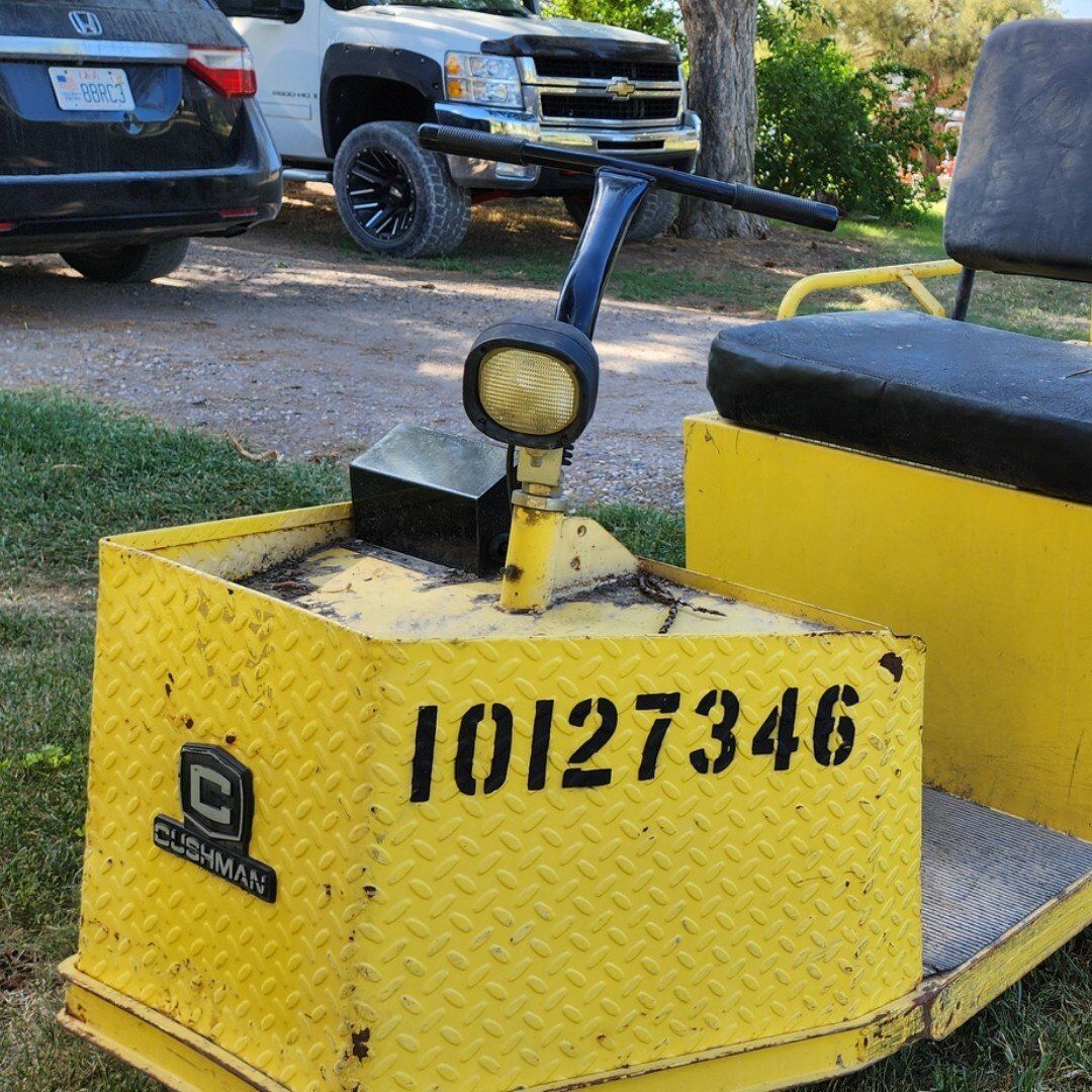 yellow electric glof cart 3 wheel utility