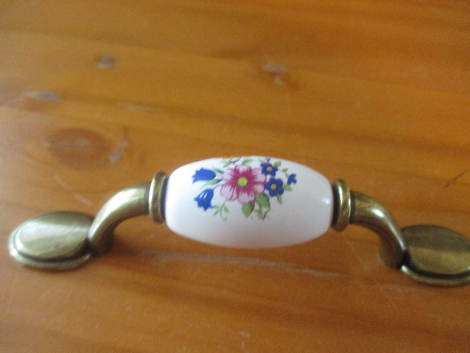 Ceramic and antique brass handles