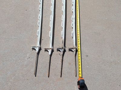 Set of 4 Used White PlasticFence Posts with Metal Spikes 48 Inches