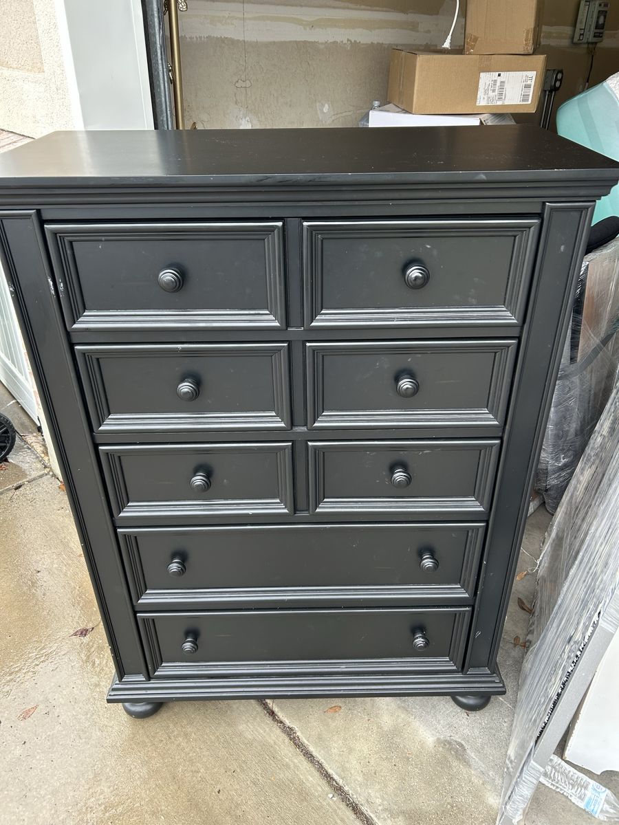 Black dresser with drawers