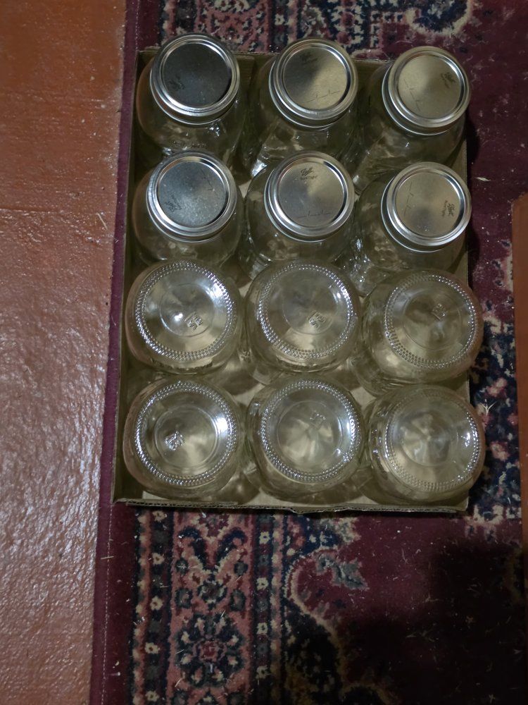 Canning supplies 2 canning pots plus 5 dozen canning jars