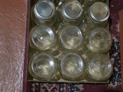 Canning supplies 2 canning pots plus 5 dozen canning jars