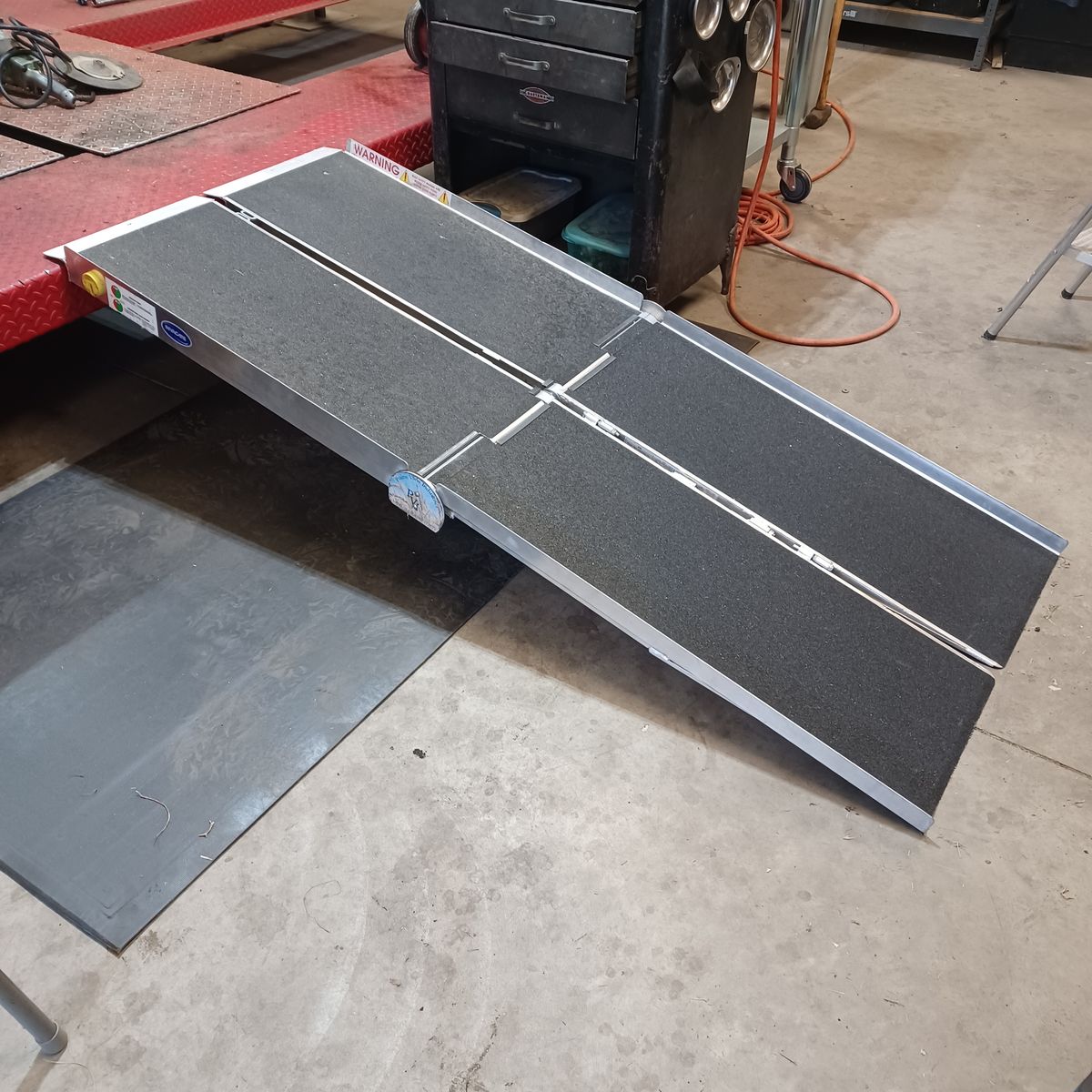 Portable wheelchair ramp