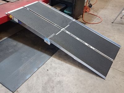 Portable wheelchair ramp