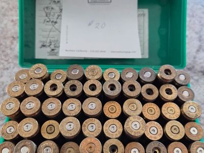 7mm Rem Mag Reloaded Brass Casings in Green Plastic Ammo Box