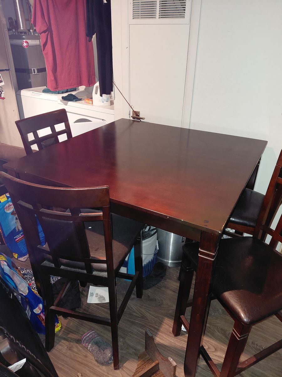 Beautiful wooden high table with chairs