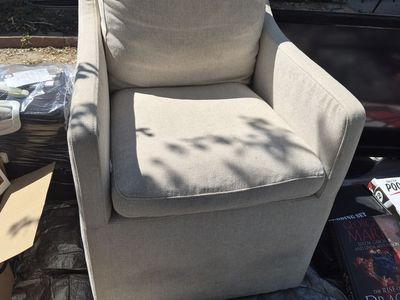 Small cream linen chair with wheels