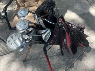 Ogio golf bag with clubs, two putters. Check pictures for more details