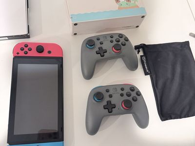 Nintendo Switch Bundle + 2 Controllers