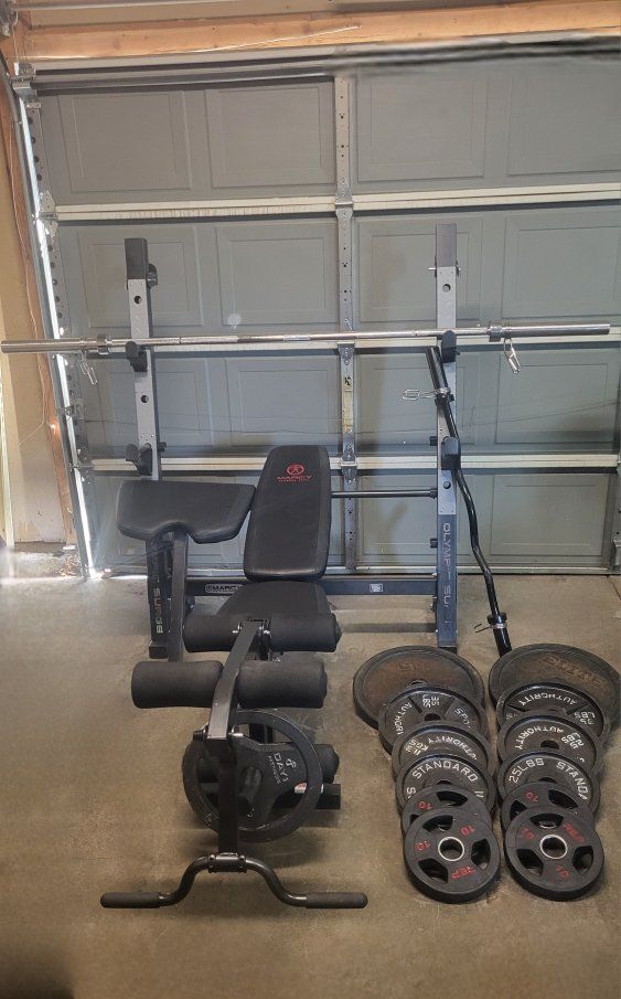 Bench and 335 pounds of weights