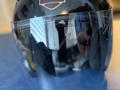 Harley-Davidson HD- J1V Black 3/4 open face helmet with retractable sun visor and outer full-face clear visor.