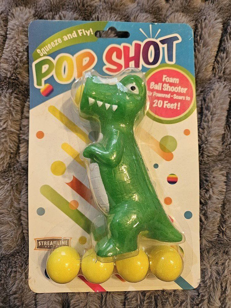 Pop Shot Dinosaur Foam Ball Shooter Toy