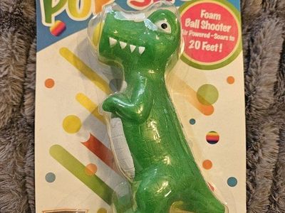 Pop Shot Dinosaur Foam Ball Shooter Toy