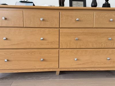 Light Brown Wood 8-Drawer Dresser with Silver Knobs - Spacious Storage Solution