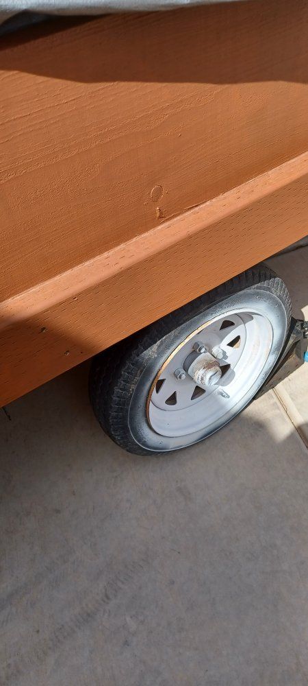 Custom Wooden/metal  Utility Trailer.   Bed has black carpet.  Heavy duty.