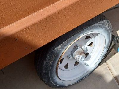 Custom Wooden/metal Utility Trailer. Bed has black carpet. Heavy duty.